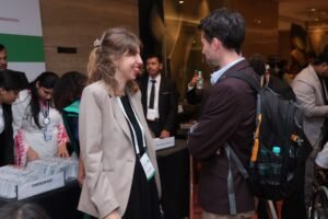 Two people in business attire at Zero Project India Confeence 2024