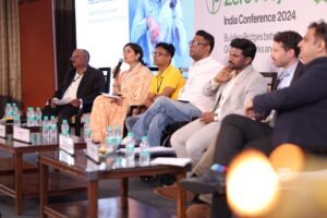 Panel of speakers seated on stage at the India Conference 2024, with water bottles on tables in front. [1](https://ppl-ai-file-upload.s3.amazonaws.com/web/direct-files/attachments/images/92849750/1c74faba-70ec-4d15-beef-ec859fffb190/image.jpg?AWSAccessKeyId=ASIA2F3EMEYE44IGQ737&Signature=EDa0kAnt20fjZrq7WolQVHjmScg%3D&x-amz-security-token=IQoJb3JpZ2luX2VjEBMaCXVzLWVhc3QtMSJHMEUCIEGp4vme01m6VBacJHOfOTOV0ug9I5Ko4xC6avJL9%2FvTAiEA23NtQriBYl1WrwMTKCrAT6%2FBW22vqdW1bNfrejRQAncq%2BgQIvP%2F%2F%2F%2F%2F%2F%2F%2F%2F%2FARABGgw2OTk3NTMzMDk3MDUiDFMjRxMgOb%2FqlrCwDSrOBPVf5cpK5pm5TeGv3wkCRC9q7ROUMNlsKtmi22WwsI0qjPfZ00QoRlhrRomLfvGiAePBSkBeCOYt0whgumc4TPskNMV%2FsQw0%2BIFLADVcSOYOl%2BEB6z1bw3eyimXoWMeJdw%2FcrRfqSQekVU%2FRFHGbvHGWzRSQyCo5Cty5rTuPW0A7936%2FJW5wsDI6eLmf3TtHLQCrKf1UVmM1IHmxPXrjFg9Y9yDzEDK13MXkj5aEq0l0BZCiyNRqZPJ1k8GkK1fGzE3mVfsV%2BnVtI84xZ6CnOIZoO8MVJ812KFgcJ8ZWehwpq80qqiPP7iavND%2BQbG5SJHCBi823XYDGJx1AJ1VsCSjIvUOJjgSbqhb7%2B3TtU9iWKR7DPUXRjqo%2Bpoeq0cvS9LaCl%2FcqL6NS9gStXObpY0zi2ghfblmdg58BLM7dmx2EXEU5KFYMGQG9Qb48p5Fwn%2B5lbi7BnGmDKBrbuhoLkgcR6sPlYocijPcGggwzGmlGK7nCzpNLIgz5f1MgtEfnnmKFtAxJisohTfHaLujKUKD38zPJzGvHwweIh1odBZaX%2BOpIu%2B0CrOpgDy%2BMnd3X26Ds5ZGrWuKEedN9N9wnr7nQbjJM8AElJioTL%2B%2F6NIlixsKT%2BGjxONHZGlWig%2Bwn0GiVmzKa00x2tf6WZpJzro2QrAcsQUTLr5gJj8nGonOgLUj0xUuVjggpJtlUDGLdThJXdQbZVpvoU6RCV49sB2ODq2J7%2BtrPGGuqOrlXxNoVkV9j%2F7z0%2B6V3GEV28inrSQpVVfkgU%2FwoyfA71%2FasMI%2FgzccGOpoBuR8cMEp3mPtf5cYJZmz7qKgOltBqkAmXd22O9Akad%2BoTgUlNOJqOwKo3lrosncSFON4HBHHeGBr23cVrDSUDxkEhx3PZny4GokPtf3DcJwzW9UGd8Gkw0V6YQBpec%2B5q3PT%2FF4EQ56YxAgu%2FWovdUgK%2B19HjoZk2Jv%2FqtZlHnaH1cORMppT9C0DiUiwtZIBuhjz0bhQcPL47tA%3D%3D&Expires=1760785510)